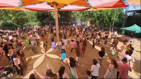 Midday Dance Celebration Under the Festival Canopy